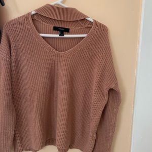 Pink V-neck knitted sweater